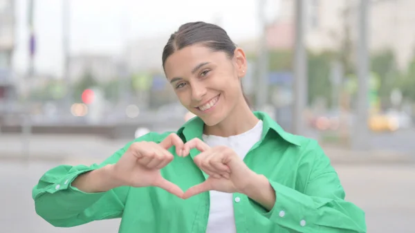 Loving Young Woman Showing Heart Shape Hands Outdoor — ストック写真