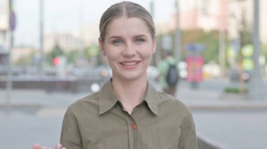 Online Video Chat by Talking Young Woman Outdoor