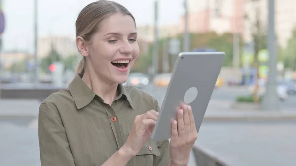 Young Woman Celebrating Success Tablet Outdoor — Stok fotoğraf