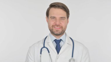 Approval by Young Adult Doctor, Shaking Head on White Background