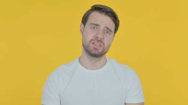 Disappointed Casual Young Man Reacting Loss Yellow Background — Stockfoto