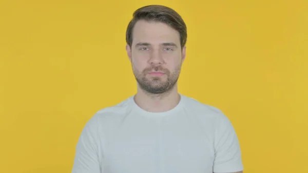 Serious Casual Young Man Yellow Background — Φωτογραφία Αρχείου