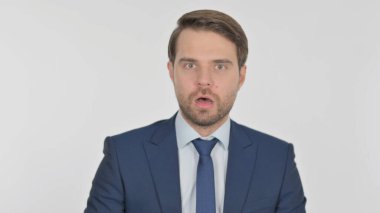 Surprised Young Adult Businessman Feeling Amazed on White Background