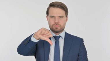 Thumbs Down by Young Adult Businessman on White Background