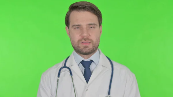 Young Adult Doctor Talking Online Video Call Green Background — Φωτογραφία Αρχείου