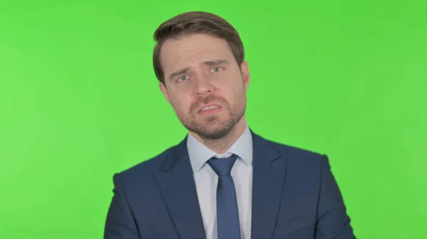 Disappointed Young Adult Businessman Reacting Loss Green Background — Φωτογραφία Αρχείου