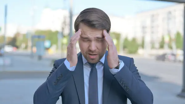 Portrait Middle Aged Businessman Having Headache Outdoor — стокове фото