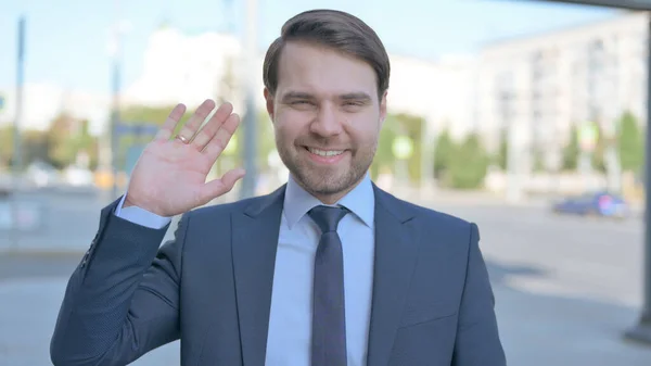 Welcoming Middle Aged Businessman Waving Hand Hello Outdoor — Photo