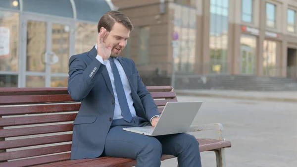 Middle Aged Businessman Talking Video Call While Sitting Outdoor Bench — Stock fotografie