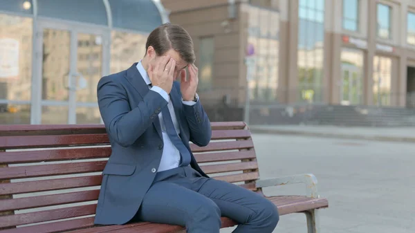 Young Businessman Headache Sitting Outdoor Bench — ストック写真