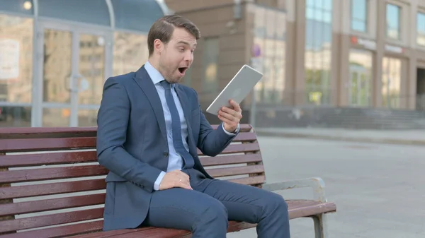 Young Businessman Celebrating Online Win Tablet Outdoor — Stock fotografie