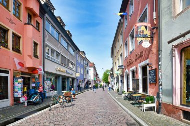 Freiburg, Germany - April 2022: Side street called 'Herrenstrasse' in old historic city center