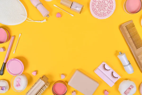 Various Makeup Beauty Products Brushes Powder Lipstick Surrounding Yellow Background — Stockfoto