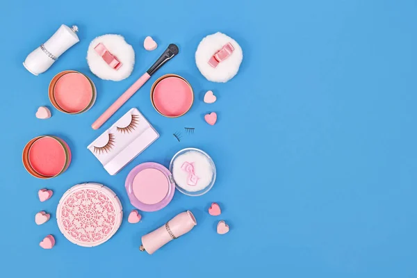 Pink Makeup Beauty Products Brushes Powder Lipstick Side Blue Background — Zdjęcie stockowe