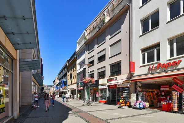 Kaiserslautern, Germany - August 2022: Shopping street called 'Fackelstrasse' with people in city center