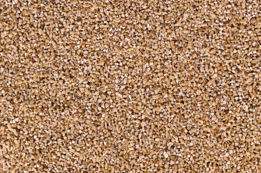 Exfoliated vermiculite, a hydrous mineral used as soilless growing medium for plants