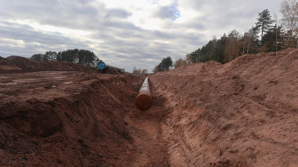 Gas pipe laid in the ground along the territory of the reserve.