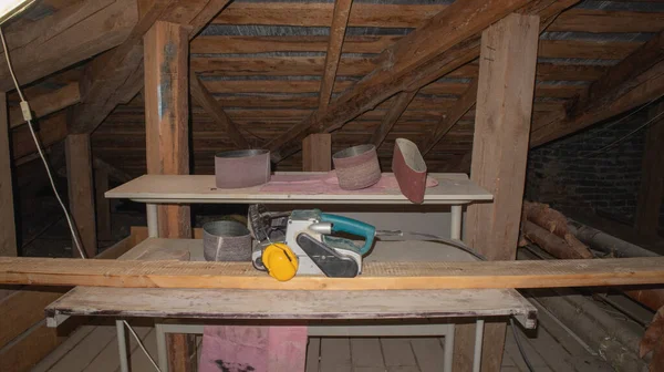 Mini carpentry workshop in the attic of the house. — Zdjęcie stockowe