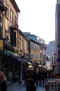 Downtown street in Bucharest, Romania 2019, people walking, vacation, beautiful day