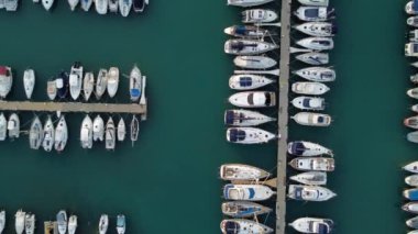 aerial view of the port of a yacht club where there are moored yachts and sailboats. overhead view. Canet den berenguer, valencia, spain.