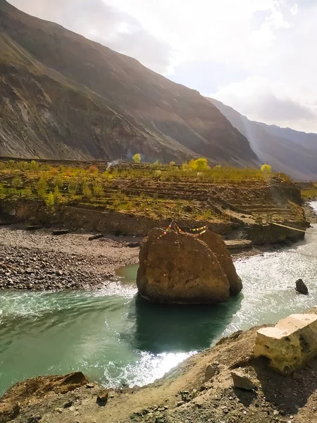 Mountain landscape river stream valley in autumn scene. River in mountain valley. Travel in Himalayas