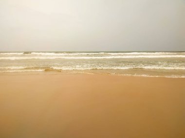 Amazing close up of wave foam on the sand