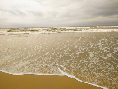 Summer beach concept - Soft wave of sea on empty sandy beach Background with copy space