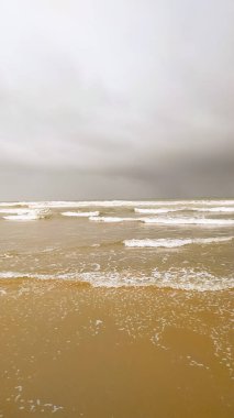 A beautiful view of white waves on the sea