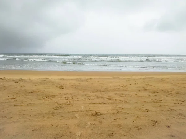 Waves Sand Beach Cloudy Sky Background — Fotografia de Stock