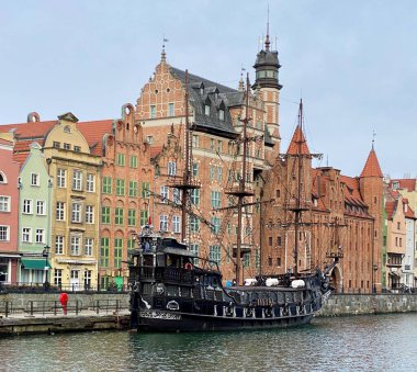Gdansk Poland January 7, 2022. Old Town, historic buildings on the Motlawa River, the Czarna Perla ship is visible