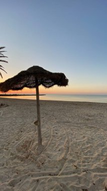 empty beaches at sunrise orange sky calm can
