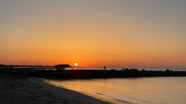 empty beaches at sunrise orange sky calm can