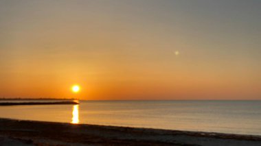 empty beaches at sunrise orange sky calm can