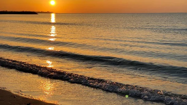 empty beaches at sunrise orange sky calm can