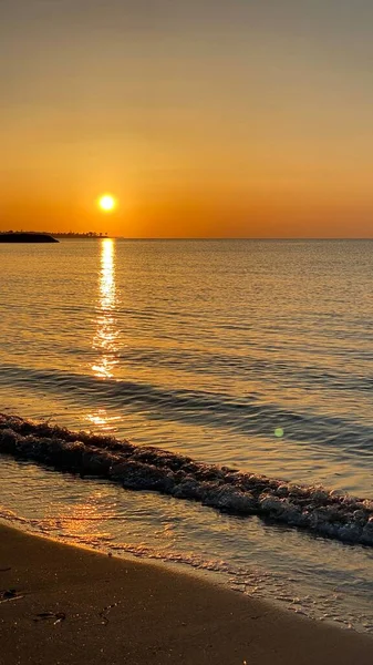 empty beaches at sunrise orange sky calm can
