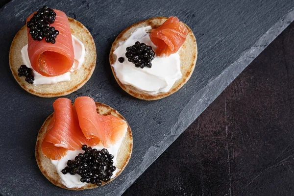 Pancakes Black Sturgeon Caviar Salmon Slate — Fotografia de Stock