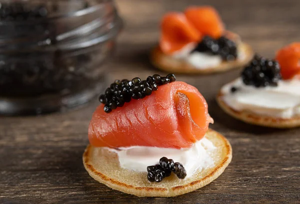 Salmon Black Sturgeon Caviar Blini Pancakes Wooden Table Close — Fotografia de Stock