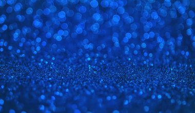 Bokeh ışıkları olan parlak bir arka plan. Seçici odaklanma. Tatil.