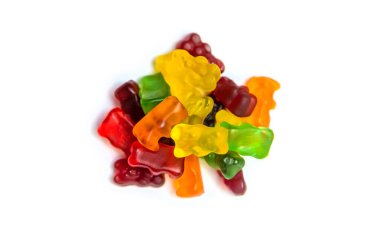 Jöle vitaminleri oyuncak ayılar beyaz arka planda izole edilir. Seçici odaklanma. Çocuk.