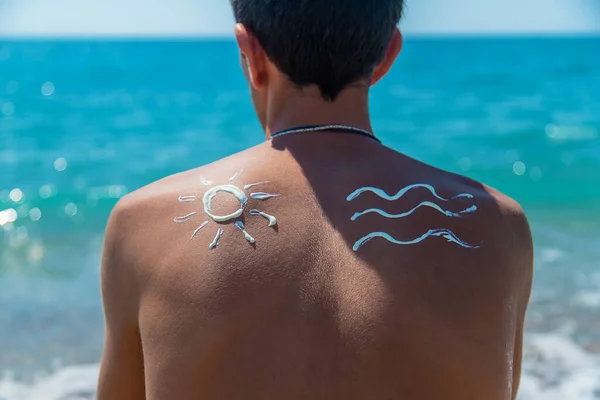 Sunscreen Man Back Selective Focus People — Stockfoto