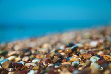 Pebbles on the beach by the sea. Selective focus. Nature.