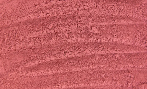 Masque texture cosmétique poudre d'argile rouge. Concentration sélective. — Photo