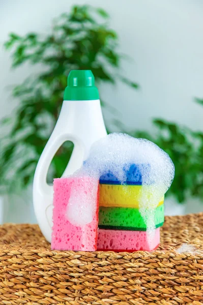 Eco household cleaner and sponge with foam. Selective focus. Nature.