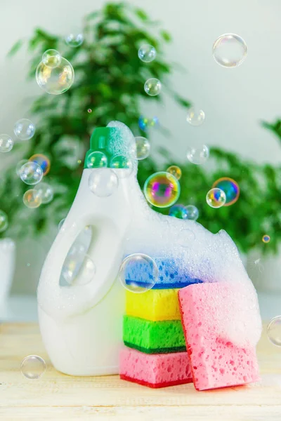 Eco household cleaner and sponge with foam. Selective focus. Nature.
