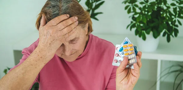 Old Woman Drinks Pill Headache Selective Focus People — Stock Photo, Image