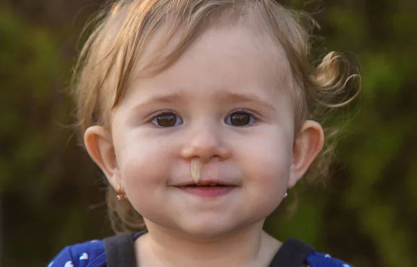 Baby Plays Snot Street Cold Nose Selective Focus Child —  Fotos de Stock