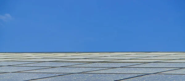 Solar panels dirty on the roof. Selective focus. Nature.