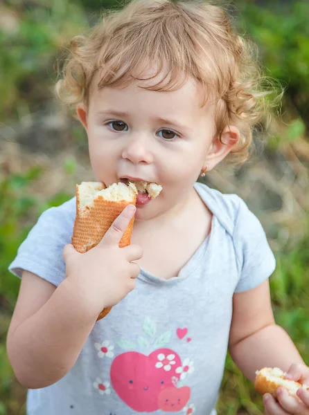 Child Eats Bread Park Selective Focus Kid — Stock Photo, Image