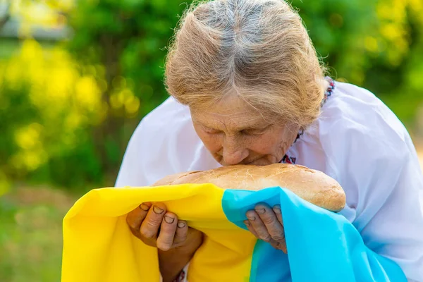 Grandmother Ukrainian Bread Her Hands Selective Focus Food — Stock Photo, Image