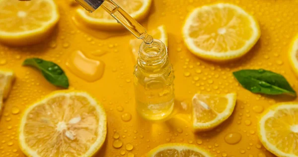 Bottle Cosmetics Drops Liquid Moisturizing Lemon Hyaluronic Acid Selective Focus — Foto de Stock